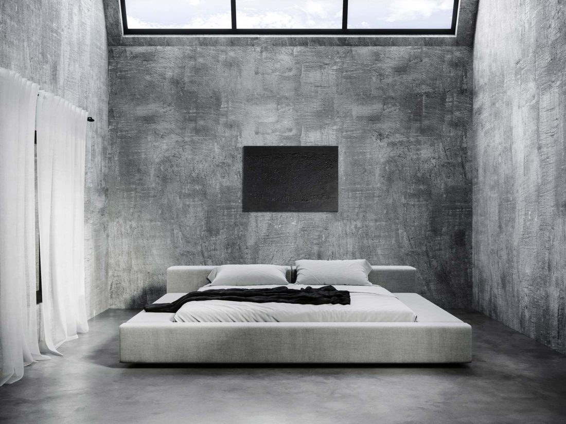 modern industrial bedroom with japanese-style bed and concrete finishings